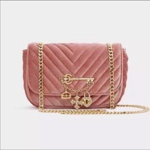 ALDO blush crossbody bag with charms